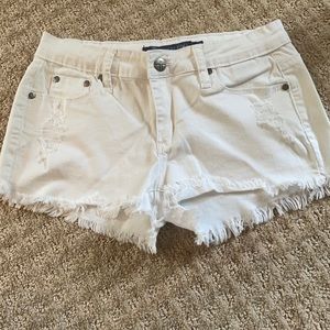 Tractr BLU distressed white jean shorts
